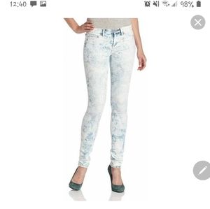 Mid rise acid wash skinny jeans
